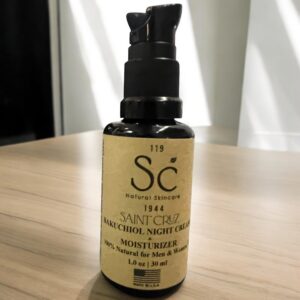 Bakuchiol night cream bottle on table.